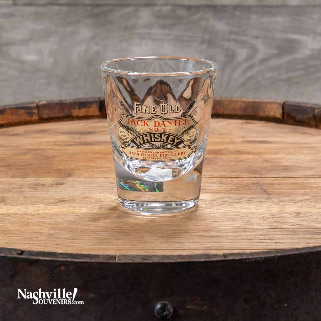 Officially licensed vintage Jack Daniel's "Fine Old Whiskey" shot glass.  This new Jack Daniel's glass is one of a series of JD collector shot glasses that feature exact reproductions of vintage Jack Daniel's logos used by the company on their products in days gone by.